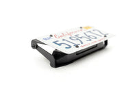 Fairlead Mounted Flip-Up License Plate Bracket